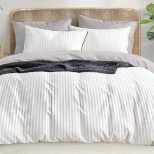 White satin stripe bedding and pillow covers in a styled bedroom — BIY Textile